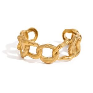 18K gold-plated twist-link cuff bracelet with a ribbed texture and open design on a white background.