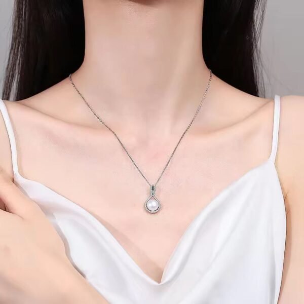 92.5 Sterling Silver Pearl Pendant and Earring Set with Green Stone Accents – Zaishree